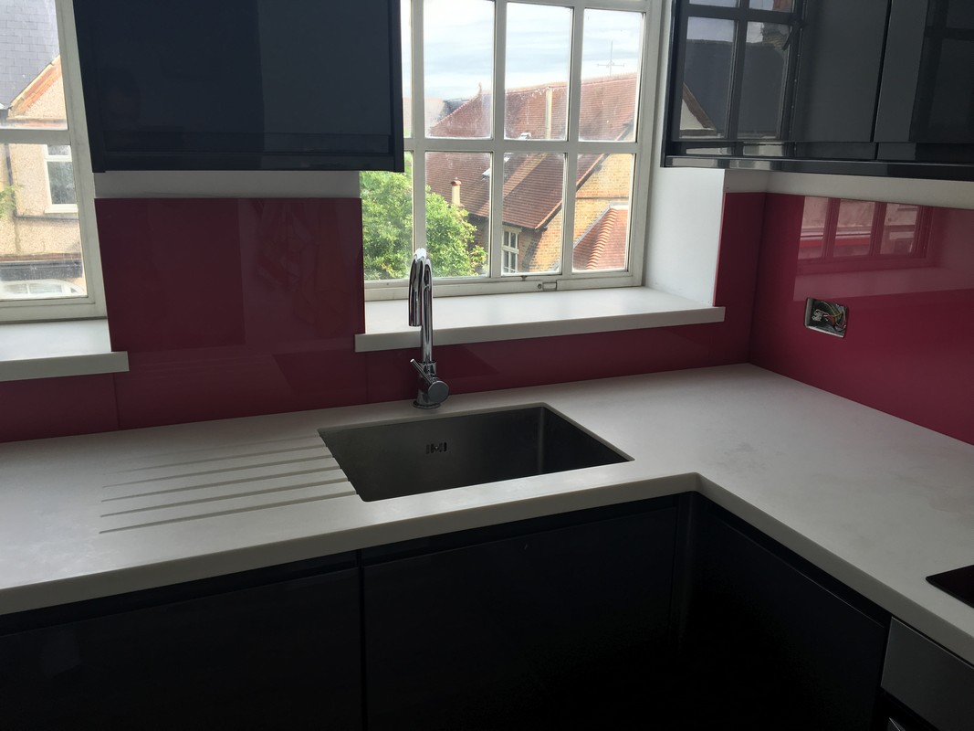 Deep plum coloured glass splashback in modern Marlow kitchen